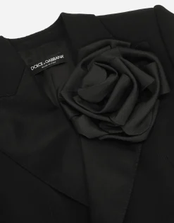 Double-breasted woolen jacket with flower appliqué