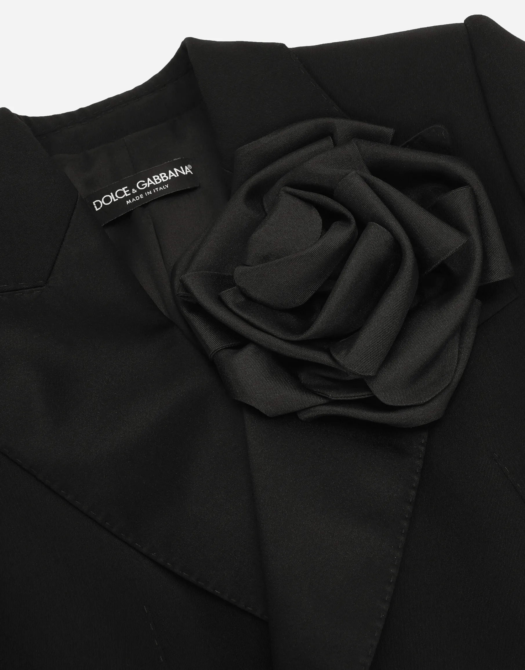 Double-breasted woolen jacket with flower appliqué