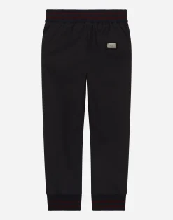 Drill jogging pants with branded tag