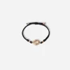 Fabric Devotion bracelet with yellow gold pendant charm