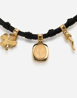 Fabric Devotion bracelet with yellow and red gold pendant charm