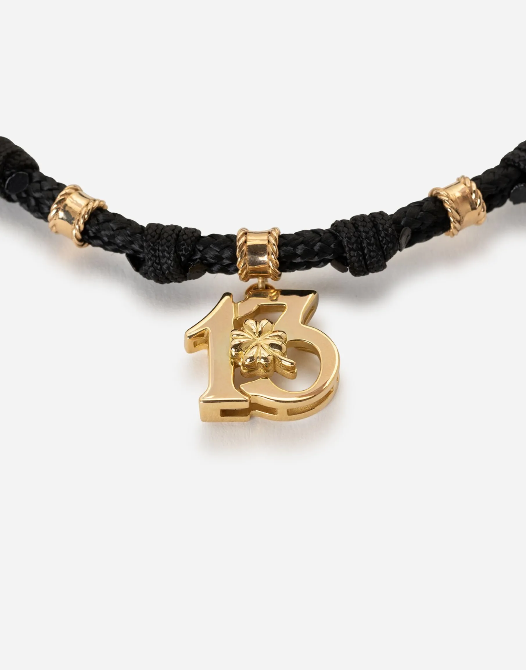 Fabric Good luck bracelet with yellow gold pendant charm
