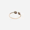 Family yellow gold bracelet with rosette motif and black sapphire
