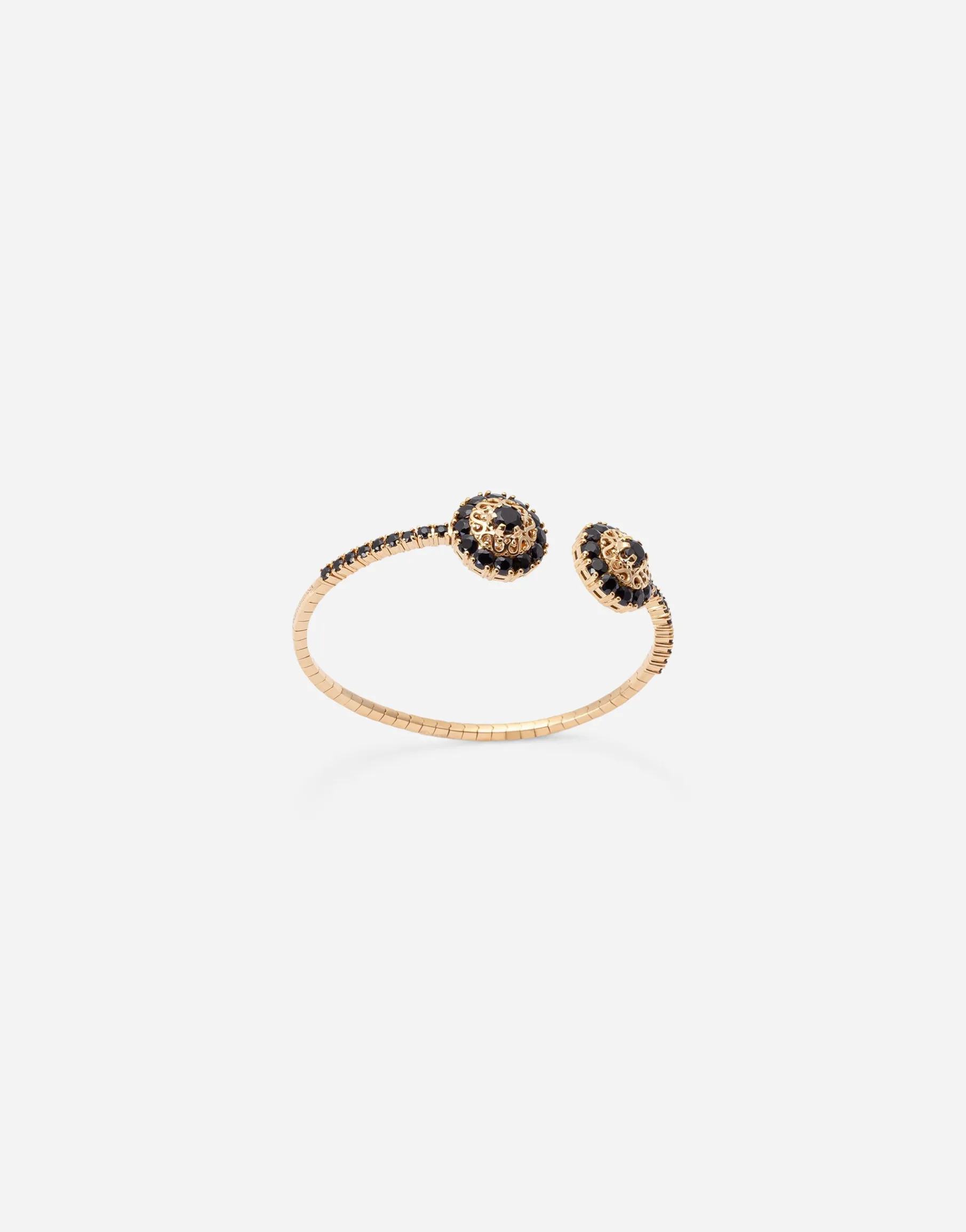 Family yellow gold bracelet with rosette motif and black sapphire
