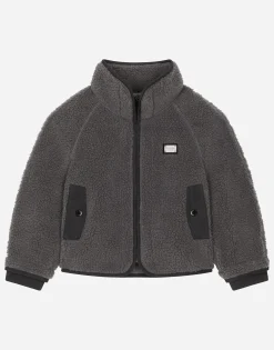Faux fur jacket with branded tag
