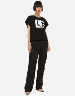 Flared jeans with ripped details