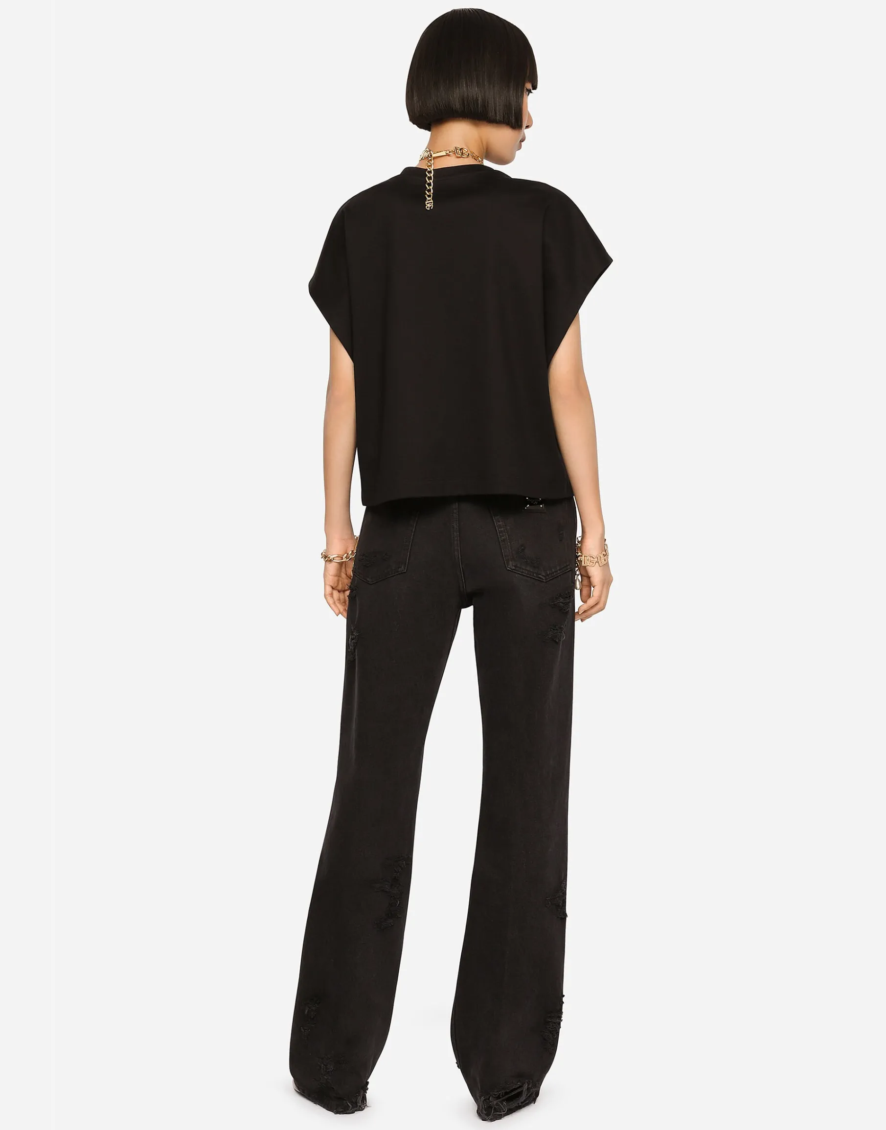 Flared jeans with ripped details
