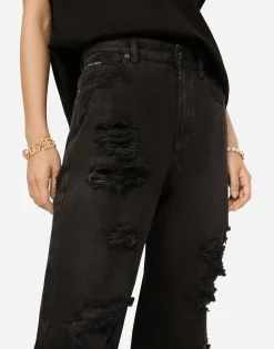 Flared jeans with ripped details