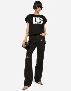 Flared jeans with ripped details