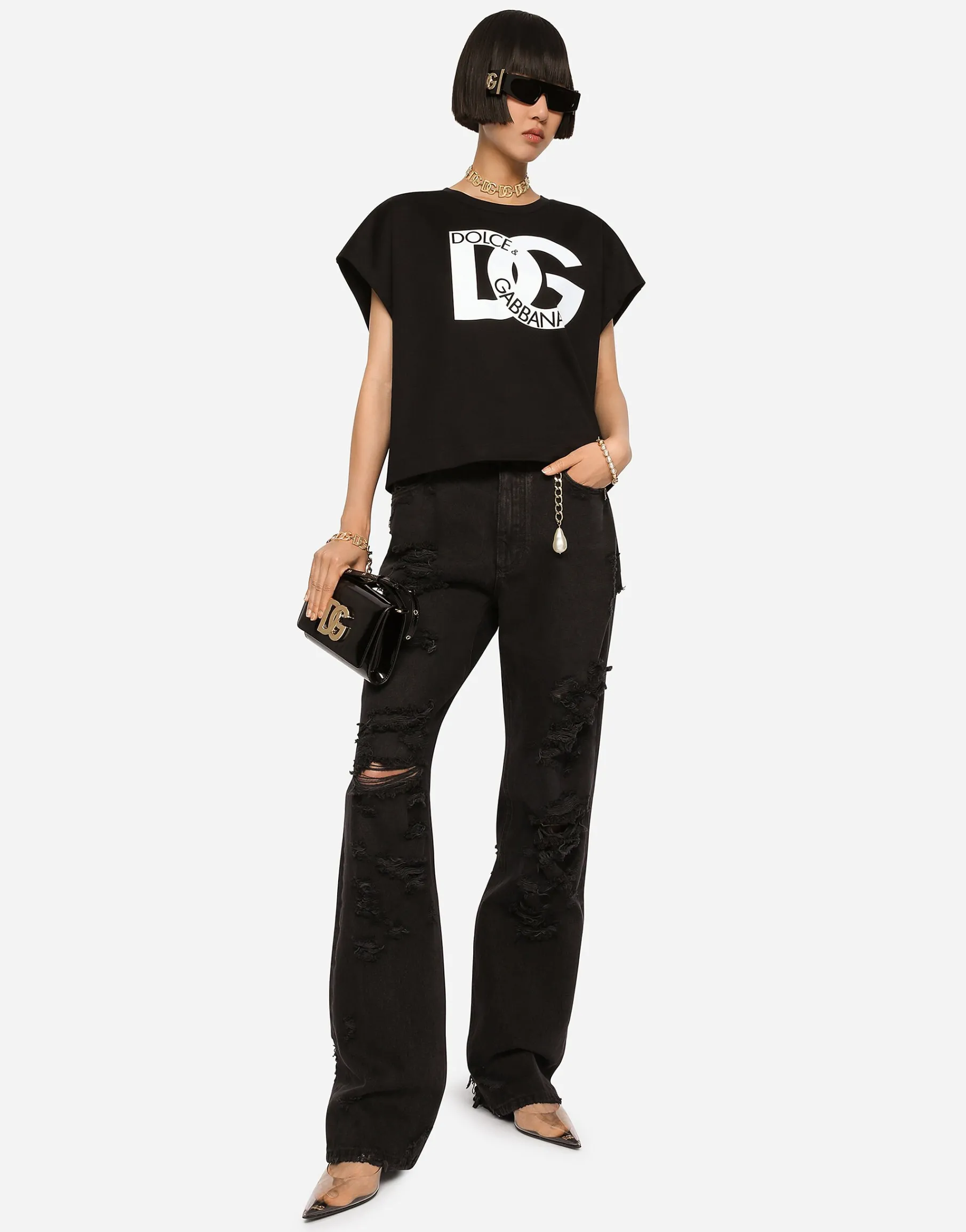 Flared jeans with ripped details