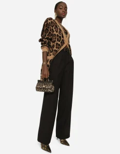 Flared wool pants with logo tag