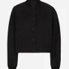 Gabardine bomber jacket, waxed on reverse, with branded tag