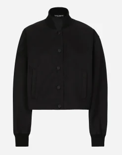 Gabardine bomber jacket, waxed on reverse, with branded tag