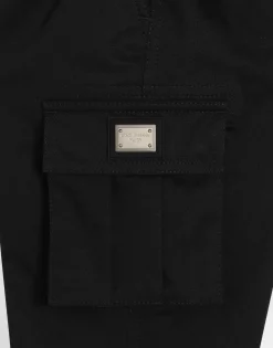 Gabardine cargo pants with branded metal tag