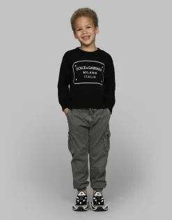 Gabardine cargo pants with branded tag