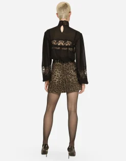 Georgette and lace turtle-neck blouse