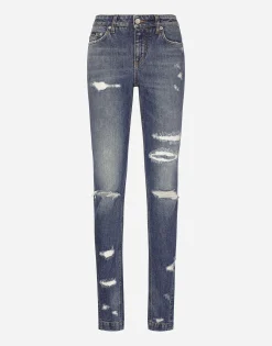 Girly jeans with ripped details
