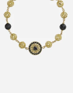 Gold bracelet with black sapphires