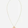 Good luck hand with horn and horseshoe pendants on yellow gold chain