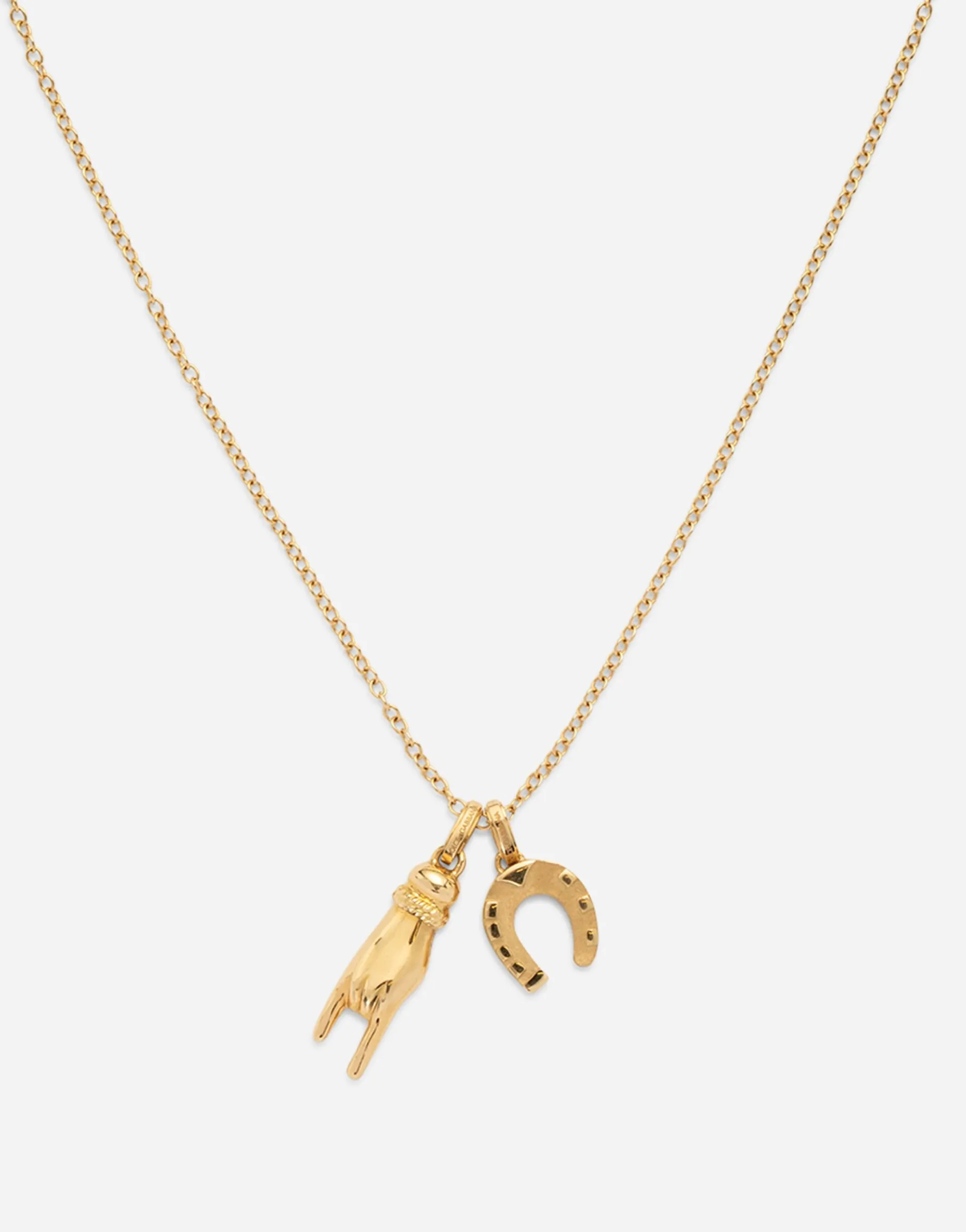 Good luck hand with horn and horseshoe pendants on yellow gold chain
