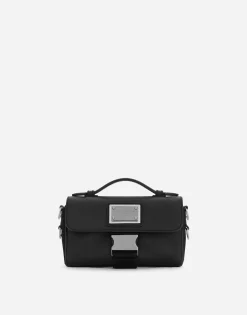Grainy calfskin and nylon crossbody bag