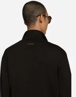 High-necked leather and wool jacket