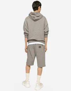 Jersey hoodie with branded tag