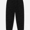 Jersey jogging pants with all-over flocked print
