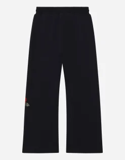 Jersey jogging pants with logo and rose print