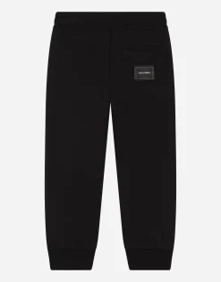 Jersey jogging pants with logo plate