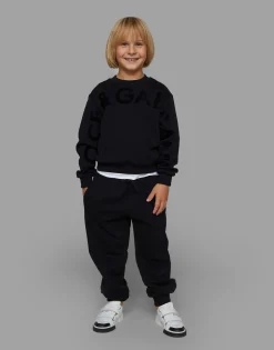 Jersey jogging pants with flocked logo