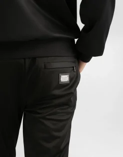Jersey jogging pants with branded tag