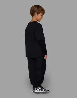 Jersey jogging pants with all-over flocked print