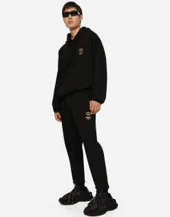 Jersey jogging pants with embroidery
