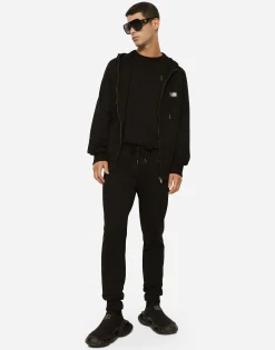 Jersey jogging pants with branded tag