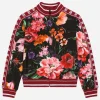 Jersey sweatshirt with floral print over a black background