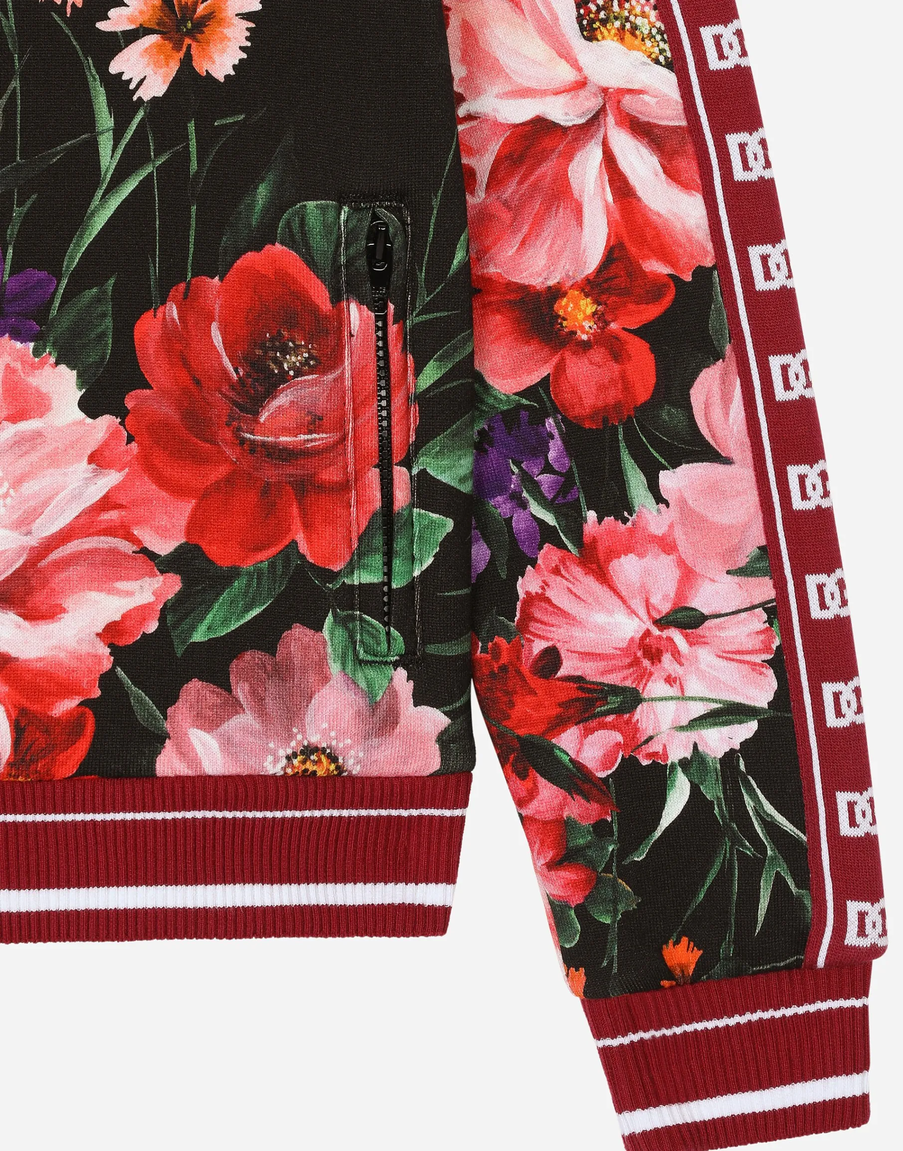 Jersey sweatshirt with floral print over a black background