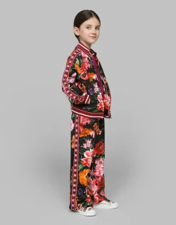 Jersey sweatshirt with floral print over a black background