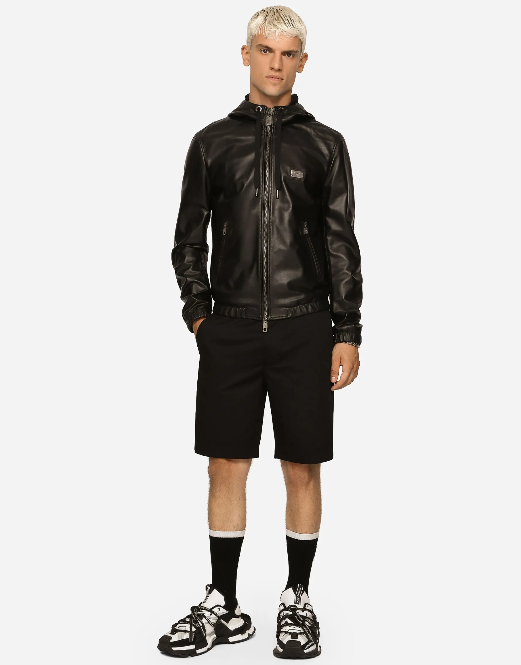 Leather jacket with hood and branded tag