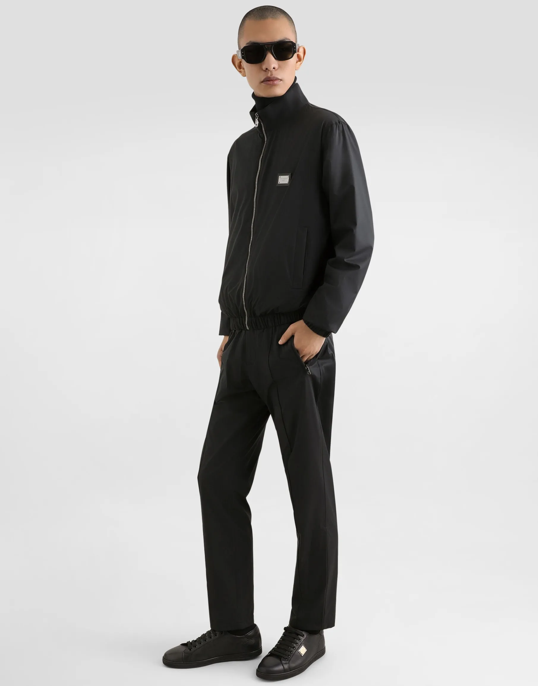 Light nylon jacket with branded tag