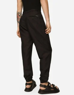 Linen and cotton jogging pants with logo label