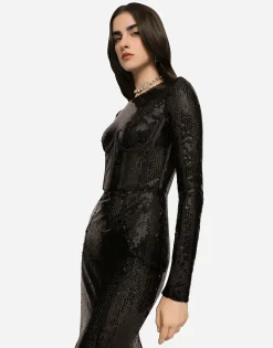 Long sequined dress with corset detailing