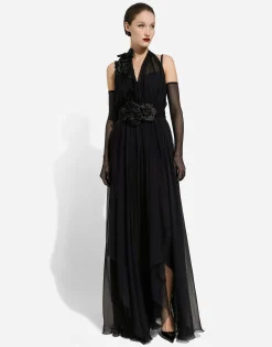 Long silk chiffon dress with floral appliqué