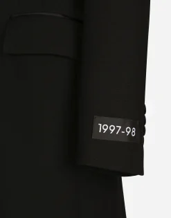 Long single-breasted wool tuxedo coat