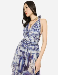 Long sleeveless chiffon dress with majolica print