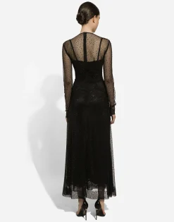 Long tulle dress with fusible rhinestone embellishment