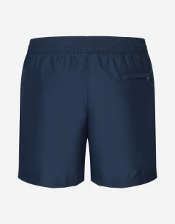Long-leg swim trunks with branded tag
