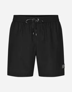Mid-length swim trunks with logo tag