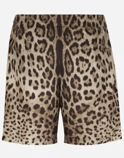 Mid-length swim trunks with leopard print