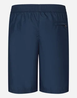 Mid-length swim trunks with branded plate